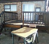 Studio Bachelor Apartment with outside Braai area-Immediately available!