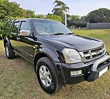 Black Beauty Isuzu KB300 T D L X Double Cab With Canopy And Mag Wheels.