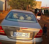 A fully serviced Mercedes benz , silver in colour , very fast , neat .